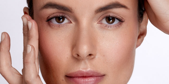 Close up of a woman's face illustrating the benefits of at-home facelifts