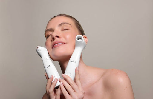 Woman chooses a NIRA Lasers over microcurrent devices