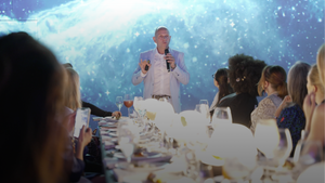 Founder speaking at a skincare event about empowering women with advanced at-home laser technology.