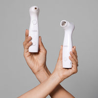 Two hands showcasing the anti-aging lasers in the NIRA Ultimate Laser Bundle