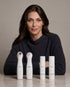 Two sleek white nira skincare devices and matching moisture-lock and youth renewal bottles in nira pro 3 ultimate bundle