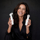 White nira pro 3 laser bundle facial cleansing device with smooth ergonomic design and rounded head for gentle cleansing