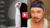 White niba facial device with sleek, ergonomic design and a rounded tip for skincare use.
